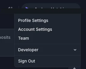 Clicking your name in the top-right corner reveals a dropdown with Account Settings